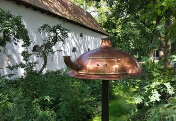 Old brew kettle outside brasserie Ter Dolen in Houthalen-Helchteren