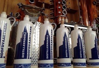 Ceramic bottles of jenever in restaurant and distillery Hoofdvaartkerk in Hoofddorp